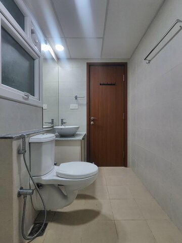 Bathroom in 2 BHK Apartment at Bhartiya Nikoo Homes Phase 2, Thanisandra Main Road – for Rent