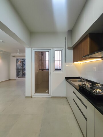 Kitchen in 2 BHK Apartment at Bhartiya Nikoo Homes Phase 2, Thanisandra Main Road – for Rent