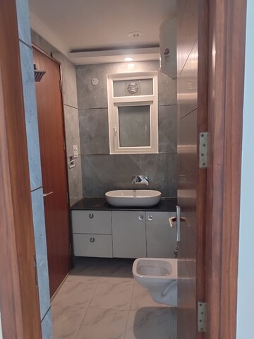 Bathroom in 4 BHK Builder Floor at Freedom Fighters Enclave – for Sale