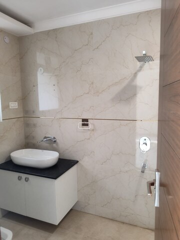 Bathroom in 4 BHK Builder Floor at Freedom Fighters Enclave – for Sale