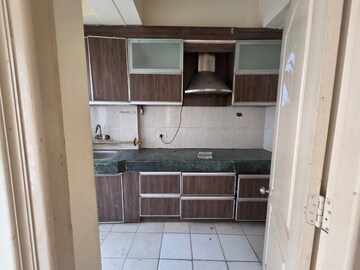 Kitchen in 2.5 BHK Apartment at Prateek Wisteria, Sector 77 – for Rent