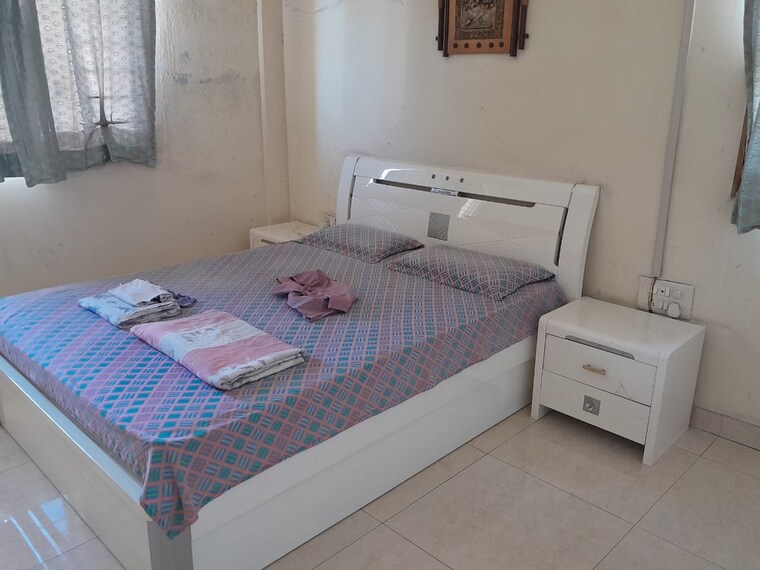 Bedroom, magarpatta-city-cosmos 3 Bedroom 1600 Sq.Ft. Apartment In Magarpatta Road Pune 9654437