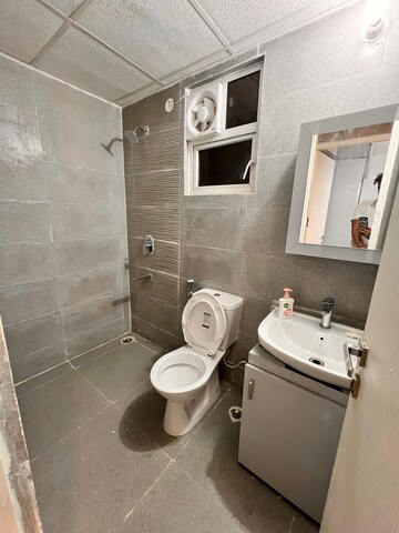 Bathroom in 1.5 BHK Apartment at AIHP Tower, Sector 18 – for Rent