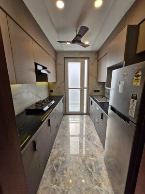 Kitchen in 1.5 BHK Apartment at ASF Towers, Udyog Vihar Phase 4 – for Rent