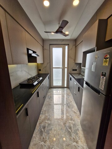 Kitchen in 1.5 BHK Apartment at ASF Towers, Udyog Vihar Phase 4 – for Rent