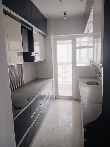 Kitchen in 3 BHK Apartment at Nirala Estate, Tech Zone 4 Greater Noida – for Rent