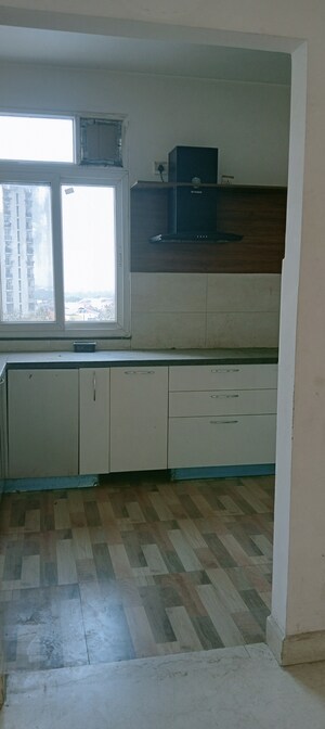 Kitchen in 3 BHK Apartment at Chandra Panorama, Sushant Golf City – for Sale