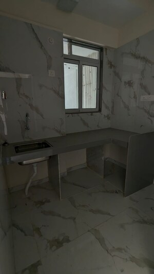 Kitchen in 1 BHK Apartment at Dotom Isle, Malad West – for Sale