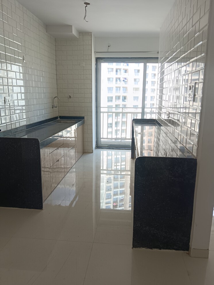 Kitchen, mutha-sai-nirvana 2 Bedroom 1085 Sq.Ft. Apartment In Shahad Thane 9654683
