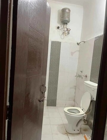 Bathroom in 3 BHK Apartment at Dhakoli – for Sale