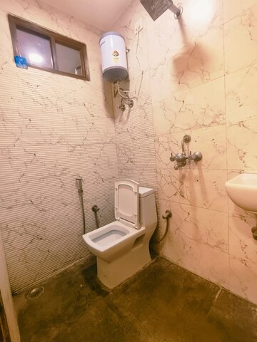 Bathroom in 1 BHK Builder Floor at Dwarka Mor – for Rent