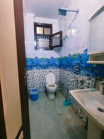 Bathroom in 3 BHK Builder Floor at Dwarka Mor – for Rent