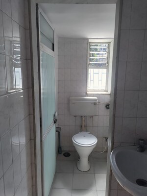 Bathroom in 1 BHK Apartment at Nutan Gangotri CHS, Andheri West – for Rent