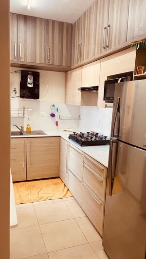 Kitchen in 2 BHK Apartment at Bhartiya Nikoo Homes, Thanisandra Main Road – for Rent
