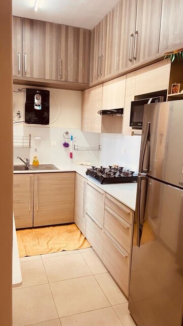 Kitchen in 2 BHK Apartment at Bhartiya Nikoo Homes, Thanisandra Main Road – for Rent