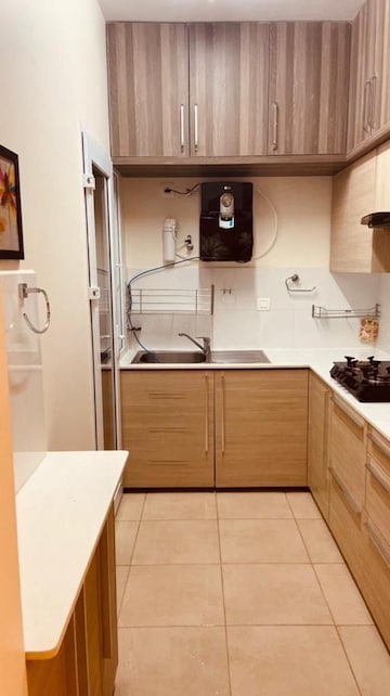 Kitchen in 2 BHK Apartment at Bhartiya Nikoo Homes, Thanisandra Main Road – for Rent