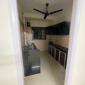 Kitchen in 2 BHK Apartment at Sameer Apartments, Yari Road – for Rent