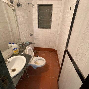 Bathroom in 2 BHK Apartment at Sameer Apartments, Yari Road – for Rent