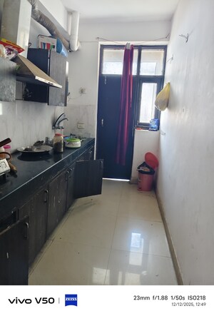 Kitchen in 2.5 BHK Apartment at Techman Moti Residency, Raj Nagar Extension – for Sale