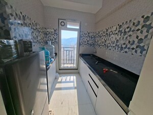 Kitchen in 1 BHK Apartment at Puraniks Tokyo Bay, Kasarvadavali – for Rent