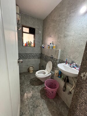 Bathroom in 2 BHK Apartment at Teenmurti Summit, Borivali East – for Rent