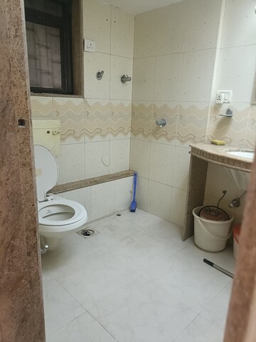 Bathroom in 3 BHK Apartment at Silver Tower, Kandivali East – for Rent