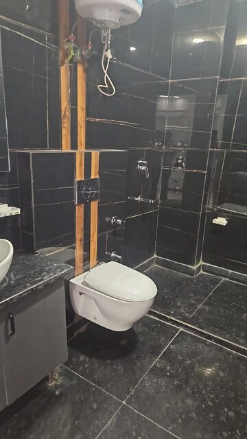 Bathroom in 2 BHK Apartment at Unitech Infospace, Sector 21 – for Rent