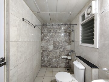 Bathroom in 3 BHK Apartment at Mantri Webcity, Hennur – for Rent