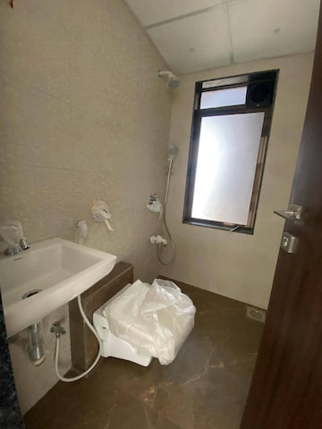 Bathroom in 1 BHK Apartment at Lalani Velentine Apartment 1 Wing D, Malad East – for Rent