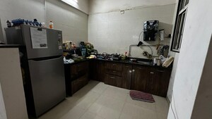 Kitchen in 2 BHK Apartment at Madhupushpa Ph-1 CHS, Wakad – for Rent