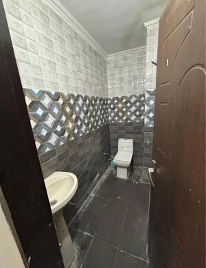Bathroom in 2 BHK Apartment at Dhakoli – for Sale