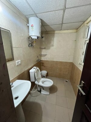Bathroom in 2 BHK Apartment at Aims Golf City, Sector 75 – for Rent