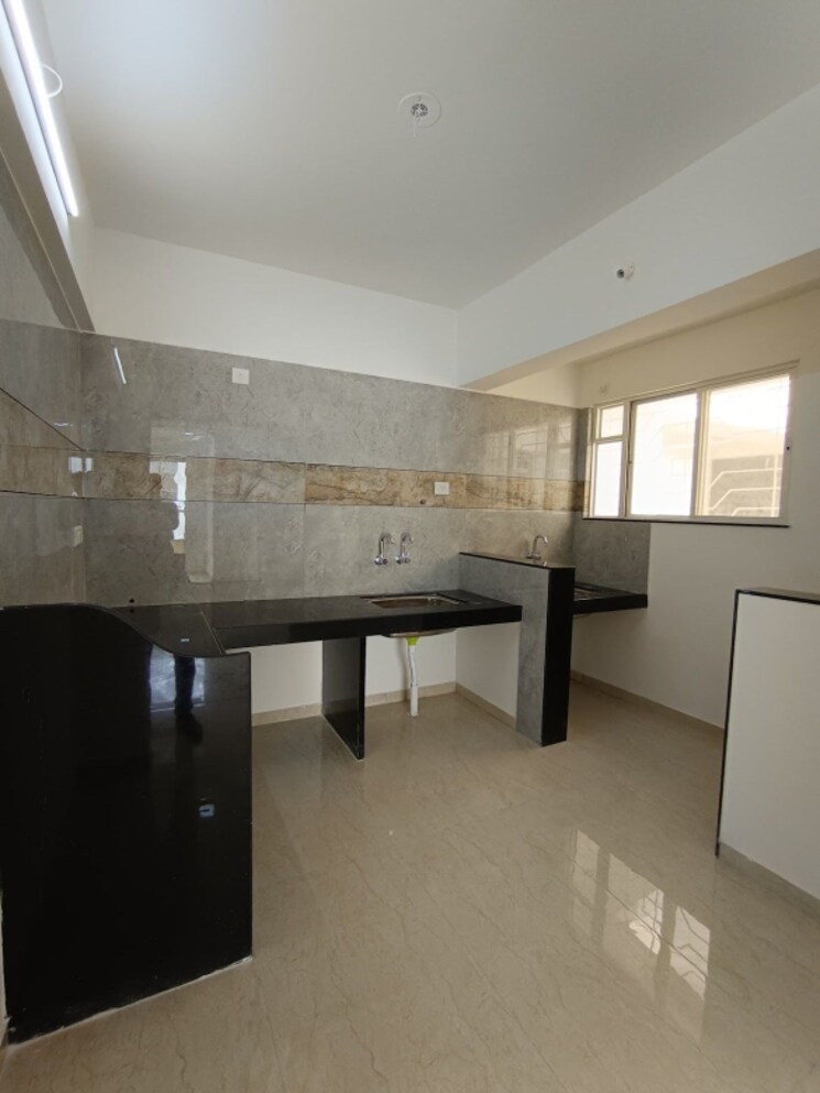 Kitchen, pantheon-acorn-park-phase-1 2 Bedroom 724 Sq.Ft. Apartment In Wakad Pune 9655263