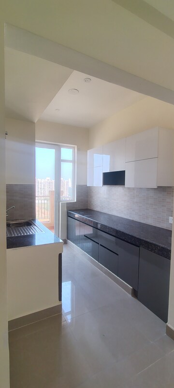 Kitchen in 2 BHK Apartment at Ansal Highland Park, Sector 103 – for Rent