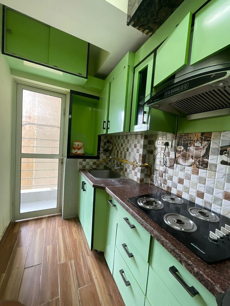 Kitchen, paras-tierea 2 Bedroom 825 Sq.Ft. Apartment In Sector 137 Noida 9655348