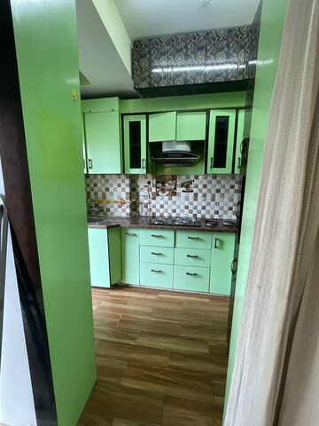 Kitchen in 2 BHK Apartment at Paras Tierea, Sector 137 – for Rent