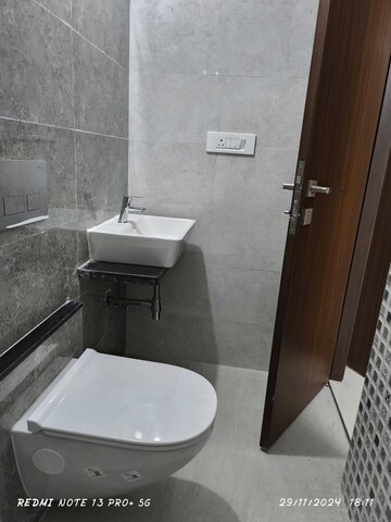 Bathroom in 1 BHK Apartment at Omkar Signet, Malad East – for Rent