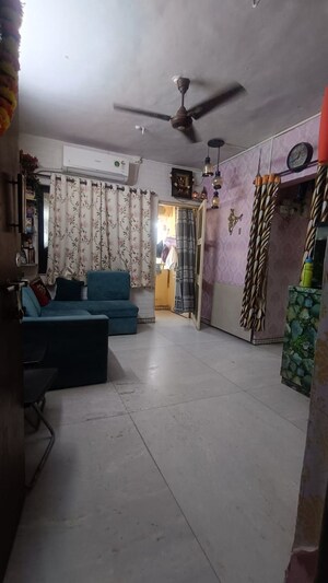 Living Room in 1 BHK Apartment at Lok Darshan, Andheri East – for Rent