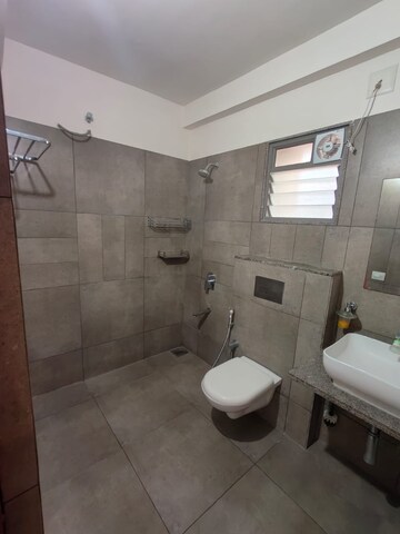 Bathroom in 3 BHK Apartment at Ambli Road – for Rent