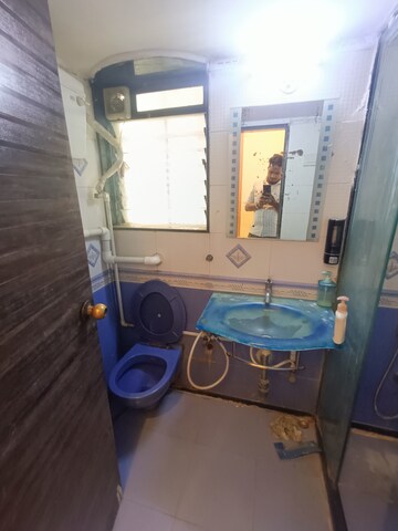 Bathroom in 2 BHK Apartment at Blue Star Apartment, Andheri West – for Rent
