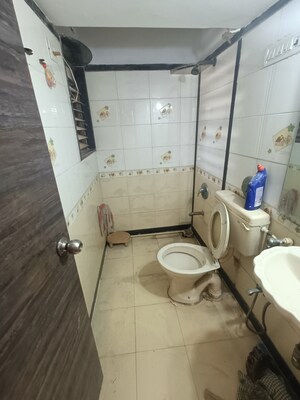 Bathroom in 2 BHK Apartment at Blue Star Apartment, Andheri West – for Rent