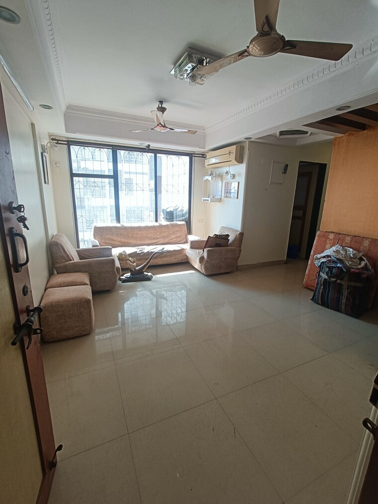 Living Room, blue-star-apartment 2 Bedroom 670 Sq.Ft. Apartment In Andheri West Mumbai 9655686