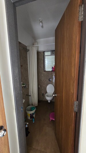 Bathroom in 2 BHK Apartment at Valentine Apartments, Goregaon East – for Rent