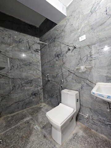 Bathroom in 1 BHK Apartment at Freedom Fighters Enclave – for Rent