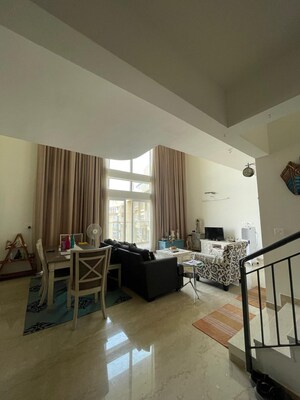 Living Room in 4 BHK Penthouse at Bhartiya Nikoo Homes Phase 2, Thanisandra Main Road – for Sale