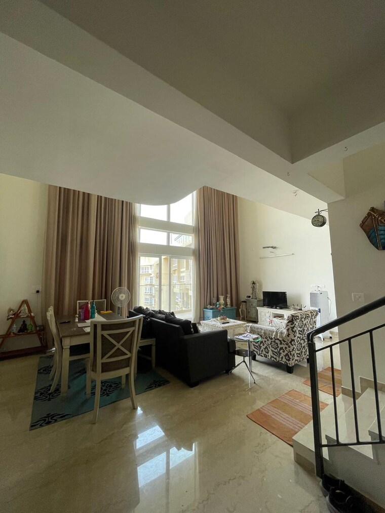 Living Room, bhartiya-nikoo-homes-phase-2 4 Bedroom 3283 Sq.Ft. Penthouse In Thanisandra Main Road Bangalore 9656186