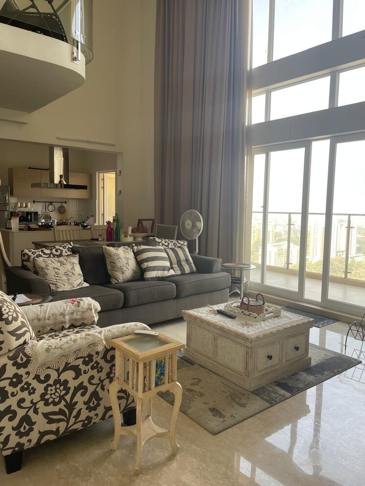 Living Room, bhartiya-nikoo-homes-phase-2 4 Bedroom 3283 Sq.Ft. Penthouse In Thanisandra Main Road Bangalore 9656186