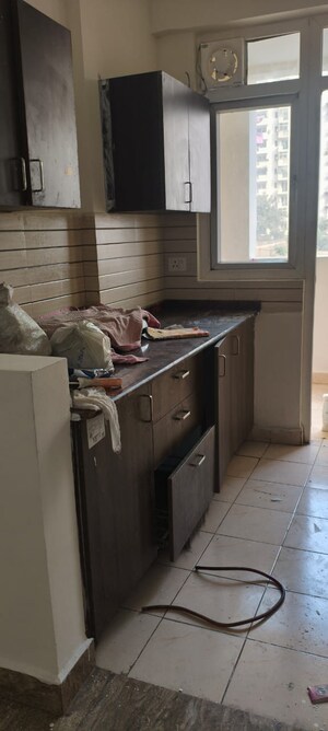 Kitchen in 2 BHK Apartment at Amrapali Silicon City, Sector 76 – for Rent
