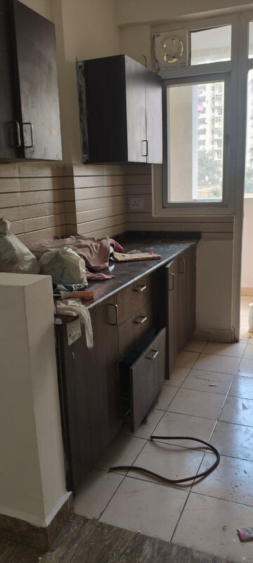 Kitchen in 2 BHK Apartment at Amrapali Silicon City, Sector 76 – for Rent