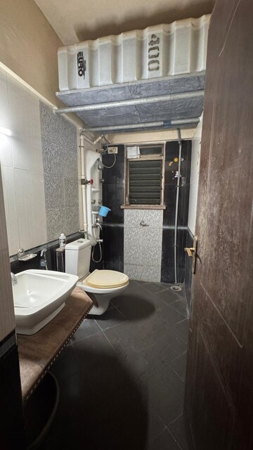 Bathroom in 2 BHK Apartment at Regency Estate, Dombivli East – for Sale